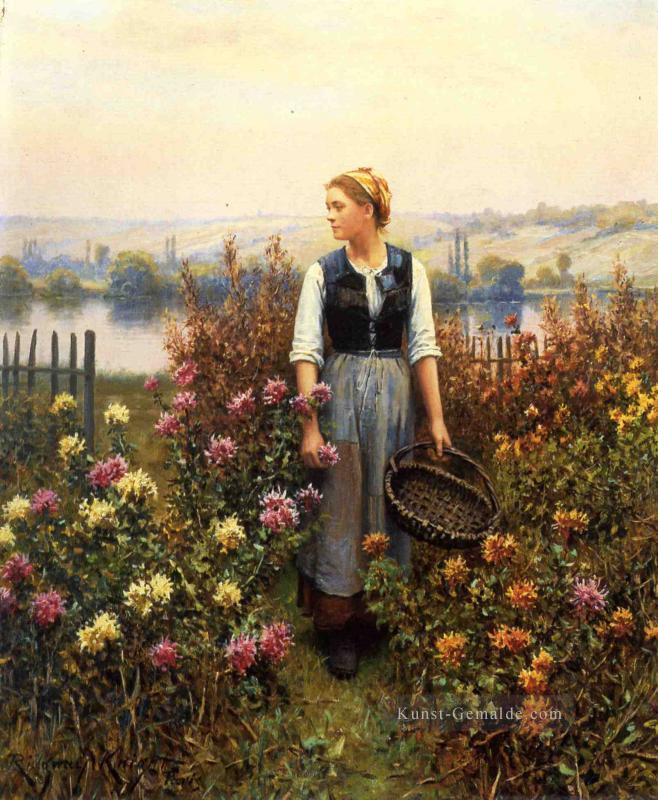 Mädchen mit einem Korb in einem Garten Landfrau Daniel Ridgway Knight Ölgemälde